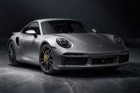 Porsche 911 price e fuel electric EV battery range performance and strategy.