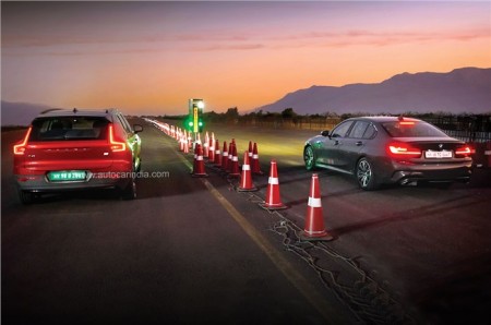 BMW M340i price drag race vs Volvo XC40 Recharge EV top speed